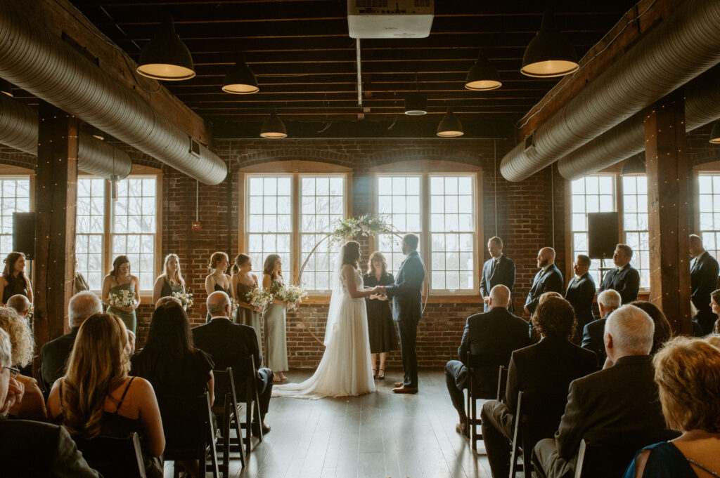 Bride and groom during their ceremony at Tinker House Events in Indianapolis 
