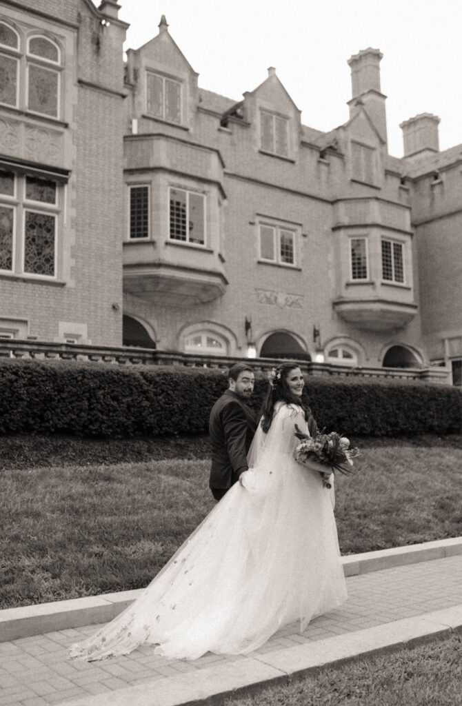 Bride and groom walking after their ceremony during their wedding at Laurel Hall in Indianapolis