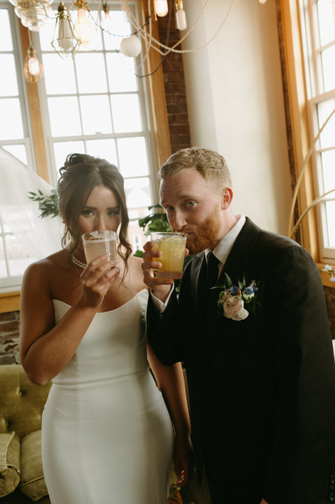 tinker house events wedding couple drinking their signature cocktails